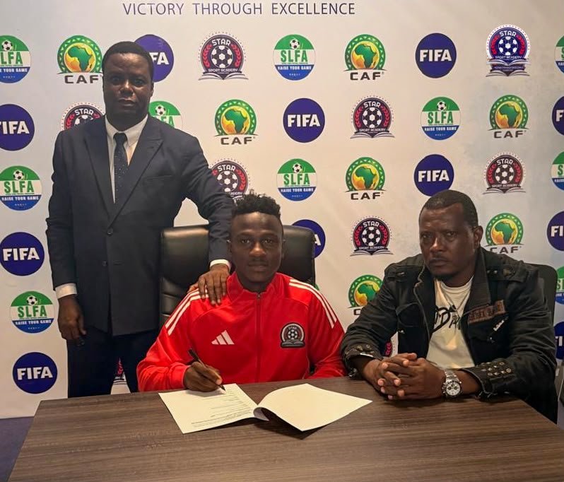 CEO Mohamed Jusu Tarawally and Team Manager Salim Pokawa with Midfielder Santigie Fornah in photo